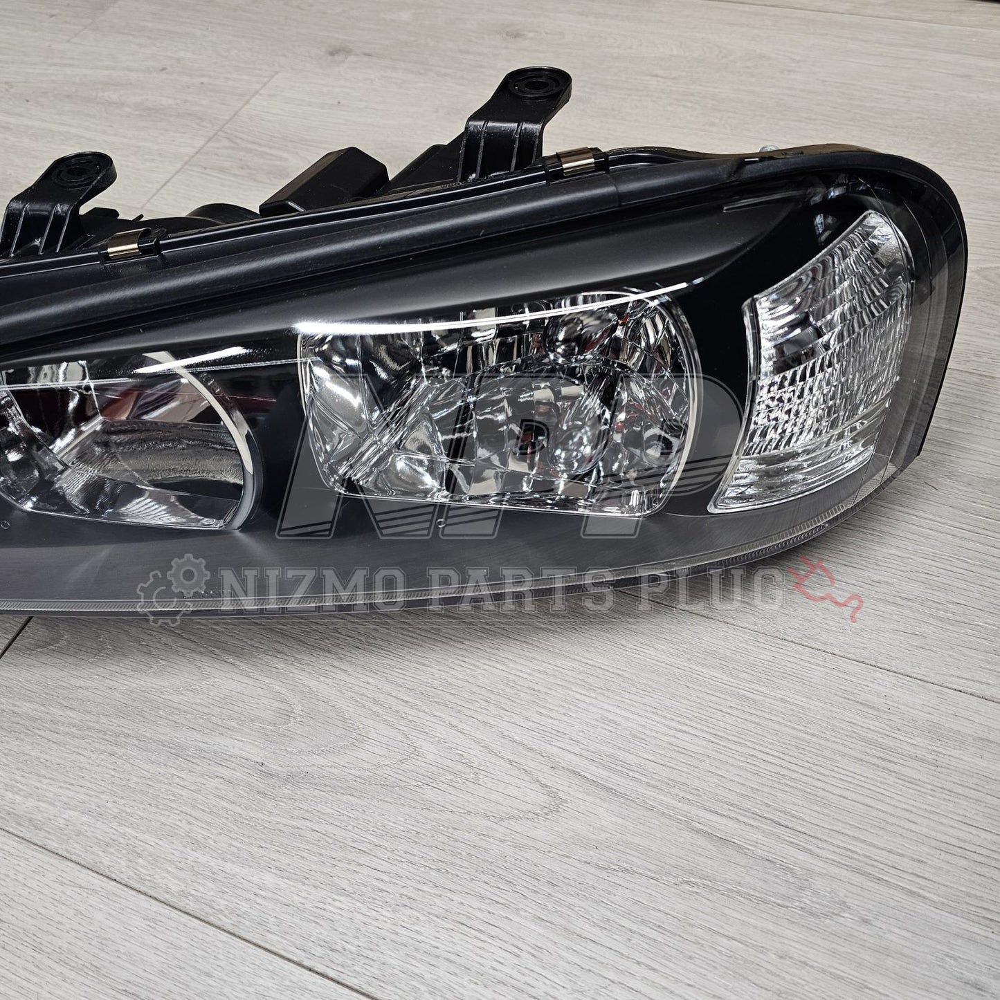 Nissan R34 Skyline Headlight Assembly LH (Halogen) - NizmoPartsPlug