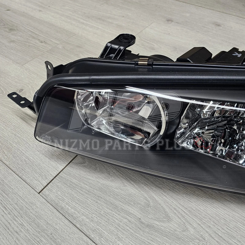 Load image into Gallery viewer, Nissan R34 Skyline Headlight Assembly LH (Halogen) - NizmoPartsPlug