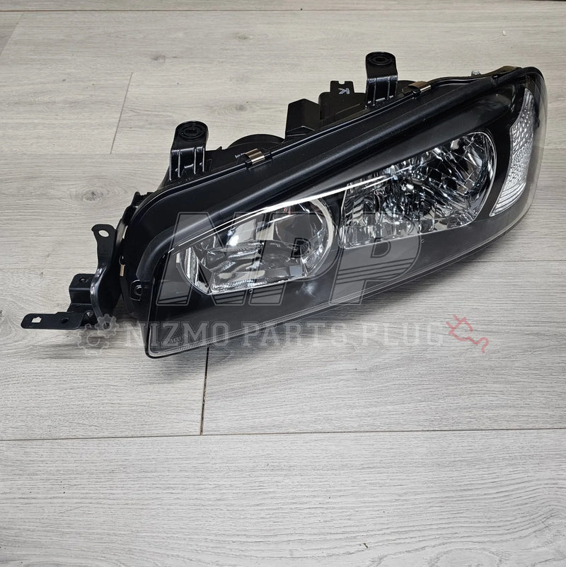Load image into Gallery viewer, Nissan R34 Skyline Headlight Assembly LH (Halogen) - NizmoPartsPlug