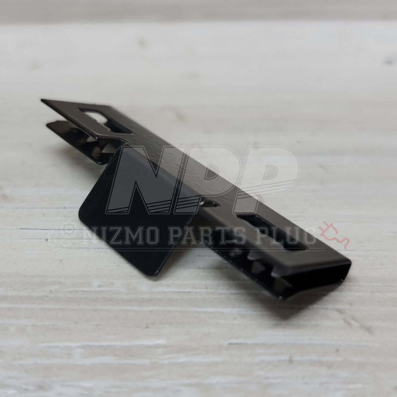 Load image into Gallery viewer, Nissan R32 Skyline GT-R Front Bumper Lower Grill Mounting Pressure Clip side view on a wooden surface