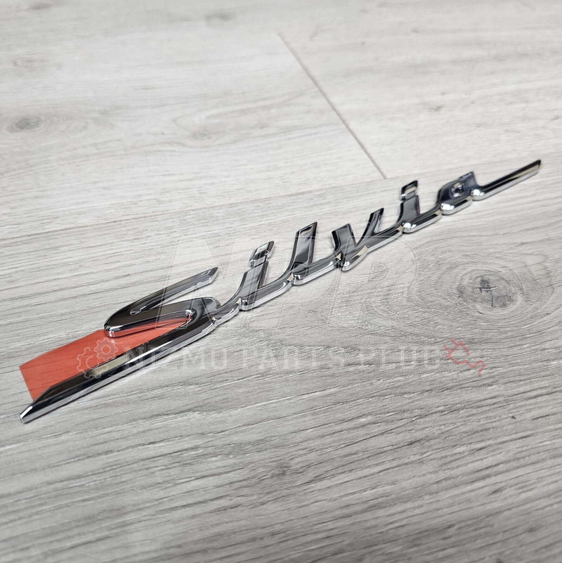 Load image into Gallery viewer, Nissan S15 Silvia Trunk Rear Emblem (Chrome) - NizmoPartsPlug
