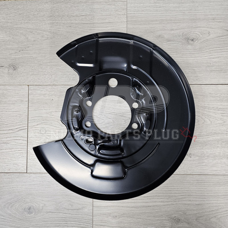 Load image into Gallery viewer, Nissan R34 Skyline GTR V-Spec Rear LH Brake Backing Plate Dust Shield - NizmoPartsPlug