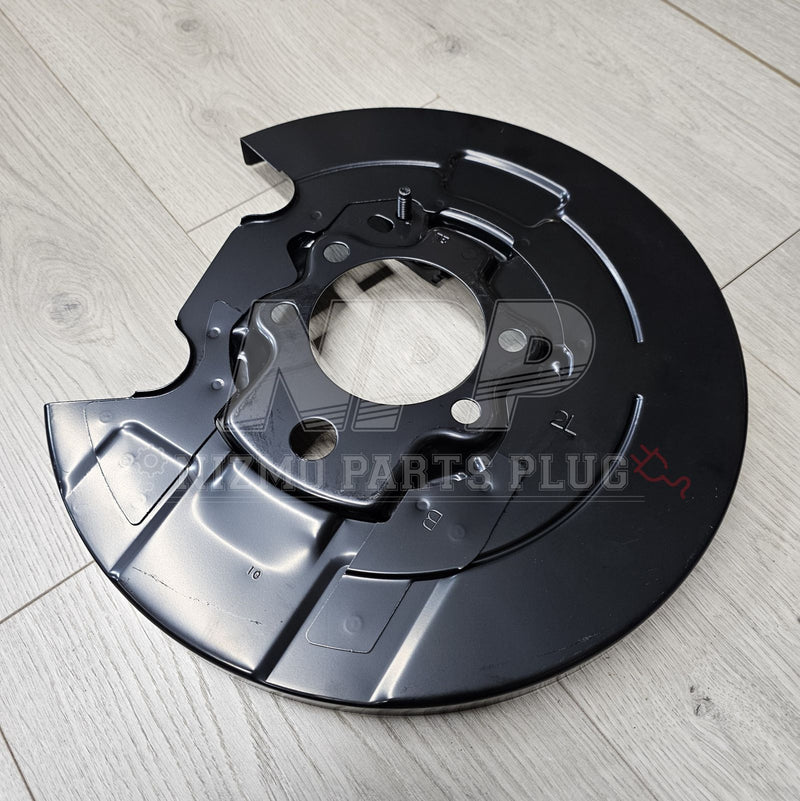 Load image into Gallery viewer, Nissan R34 Skyline GTR V-Spec Rear LH Brake Backing Plate Dust Shield - NizmoPartsPlug