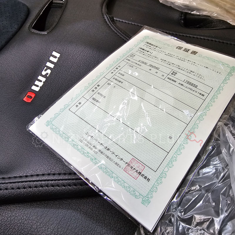 Load image into Gallery viewer, New R34 Nissan Skyline GT-R Nismo black leather seat covers with authentic warranty card and branded logos.