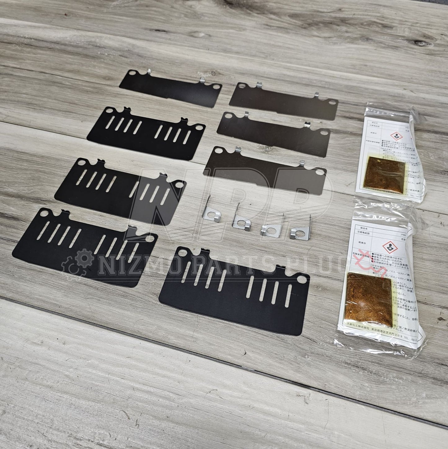 Nissan OEM Front Brake Disk Pad Hardware Kit (R33 GTS/R34 GTT) - NizmoPartsPlug