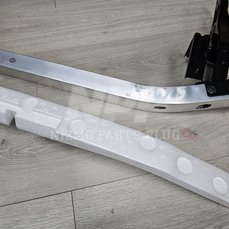 Load image into Gallery viewer, R34 Skyline GTR Front Bumper Reinforcement+Absorber Set - NizmoPartsPlug