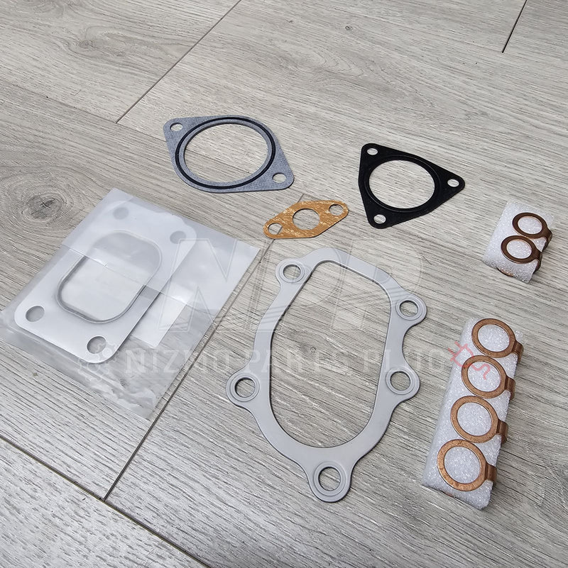 Load image into Gallery viewer, Nissan S14/S15 Silvia SR20DET Turbocharger Gasket Kit - NizmoPartsPlug