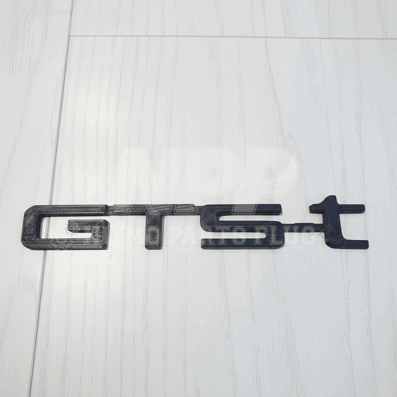 Load image into Gallery viewer, Mīrai Mamōru Skyline Exterior GTST Emblem (GTST STYLE)