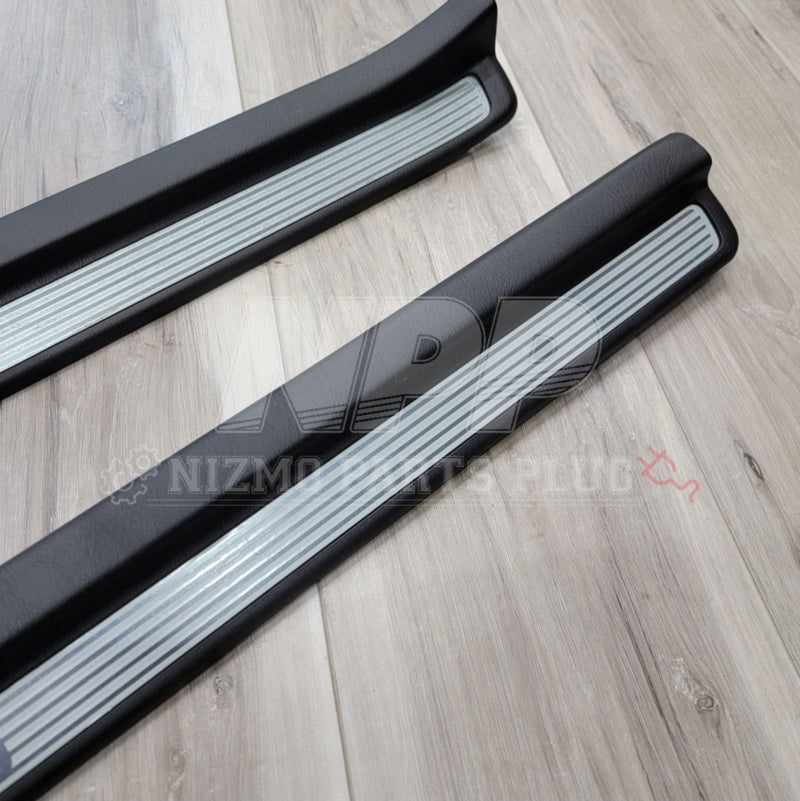 Load image into Gallery viewer, Nissan R34 Skyline GTR Interior Door Sill Cover Plate Set - NizmoPartsPlug