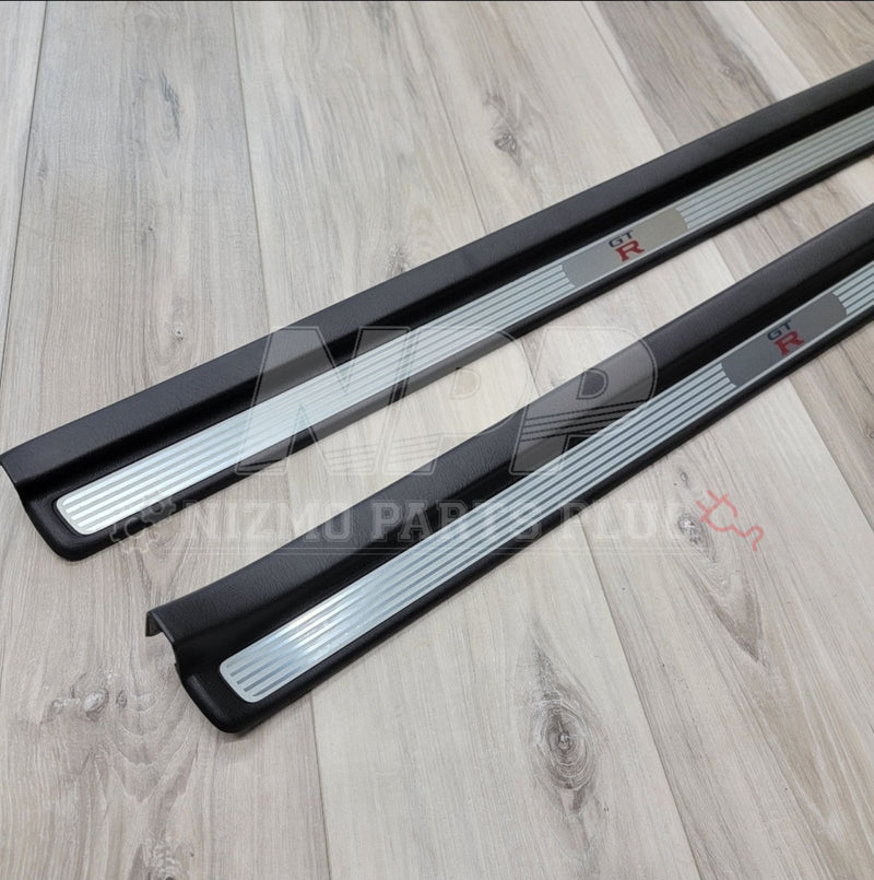 Load image into Gallery viewer, Nissan R34 Skyline GTR Interior Door Sill Cover Plate Set - NizmoPartsPlug