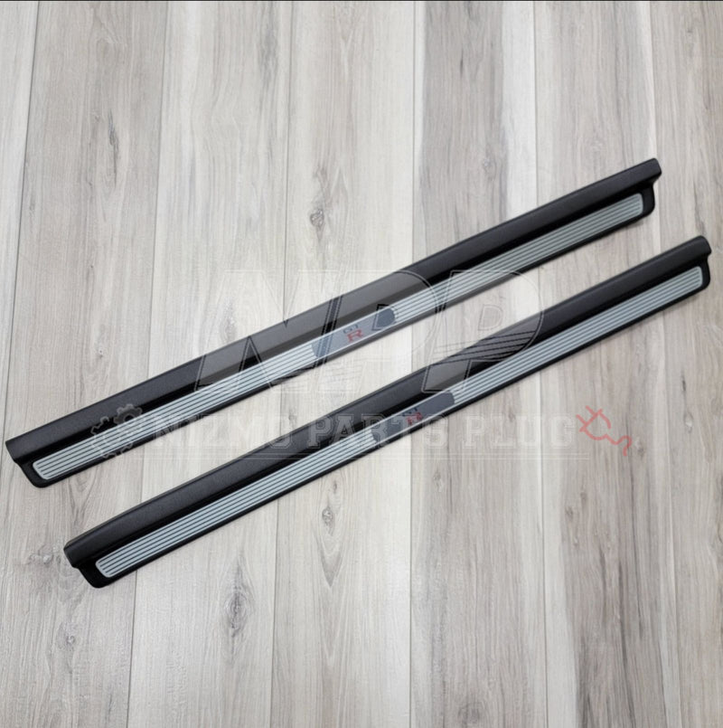Load image into Gallery viewer, Nissan R34 Skyline GTR Interior Door Sill Cover Plate Set - NizmoPartsPlug