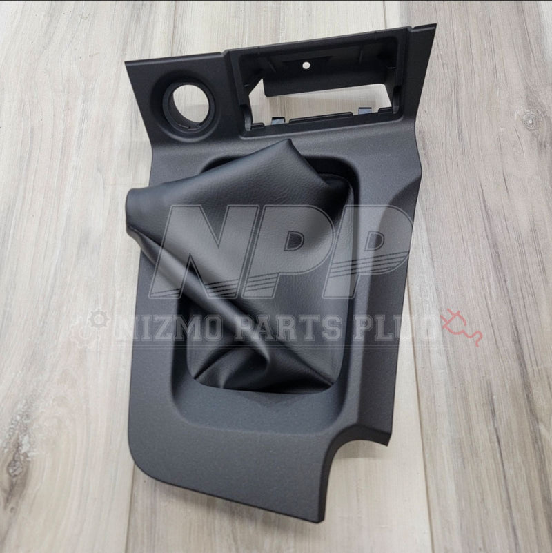 Load image into Gallery viewer, Car interior panel on a wooden surface with Nismo branding.