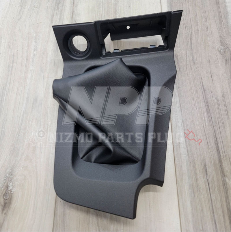 Load image into Gallery viewer, Car interior panel on a wooden surface with Nismo branding.