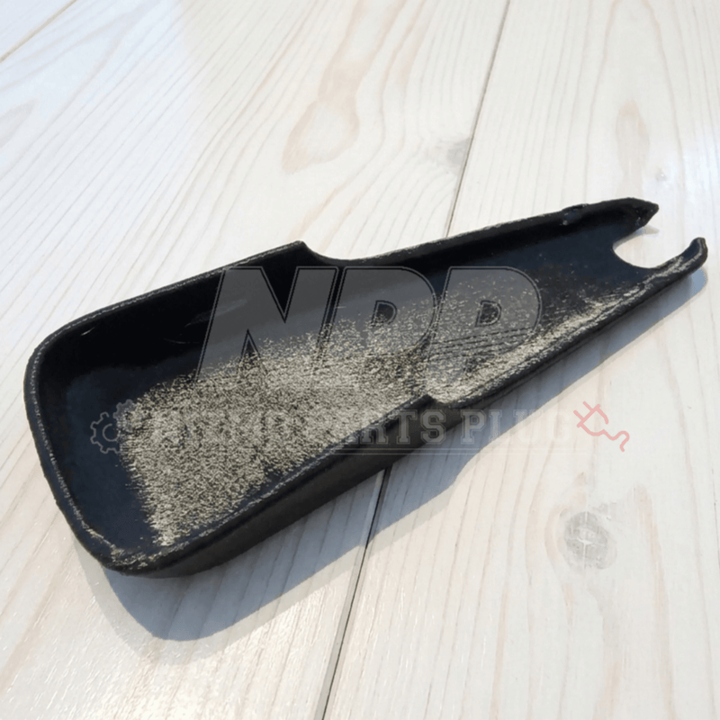 Load image into Gallery viewer, Black rear-view mirror cover for Nissan Skyline R32, R33, and R34. Shows signs of wear/fading.