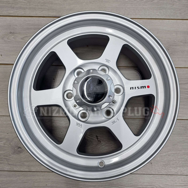 Cargue la imagen en el visor de la galería, Nismo Frontier Rays Engineering TE37X Wheel Assembly 16x7 6 lug on wooden surface
