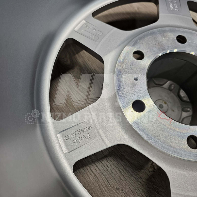 Cargue la imagen en el visor de la galería, Nismo Frontier Rays Engineering TE37X Wheel Assembly 16x7 6 lug, close-up of wheel details with Rays Engineering logo.