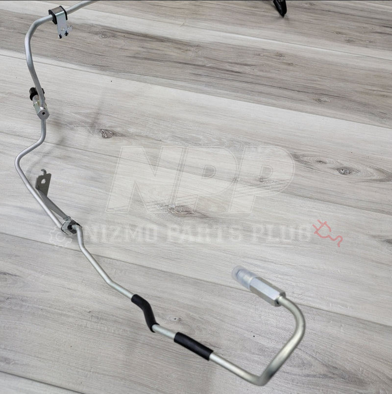 ギャラリービューアに画像をロードする, New silver Nissan R32 GTR high pressure power steering hose assembly with black heat shielding.