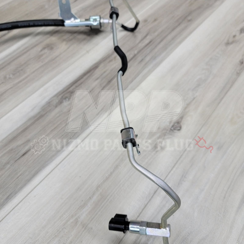 ギャラリービューアに画像をロードする, New Nissan R32 Skyline GT-R high pressure power steering hose assembly with silver metal piping and black rubber hose.