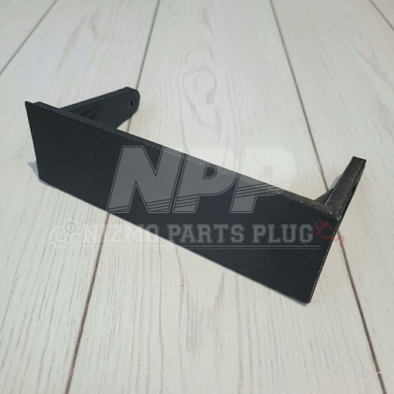 Cargue la imagen en el visor de la galería, Matte black Mirai Mamoru N1 single DIN delete mask cover for Nissan Skyline R32, R33, and S14 on a white wood surface.