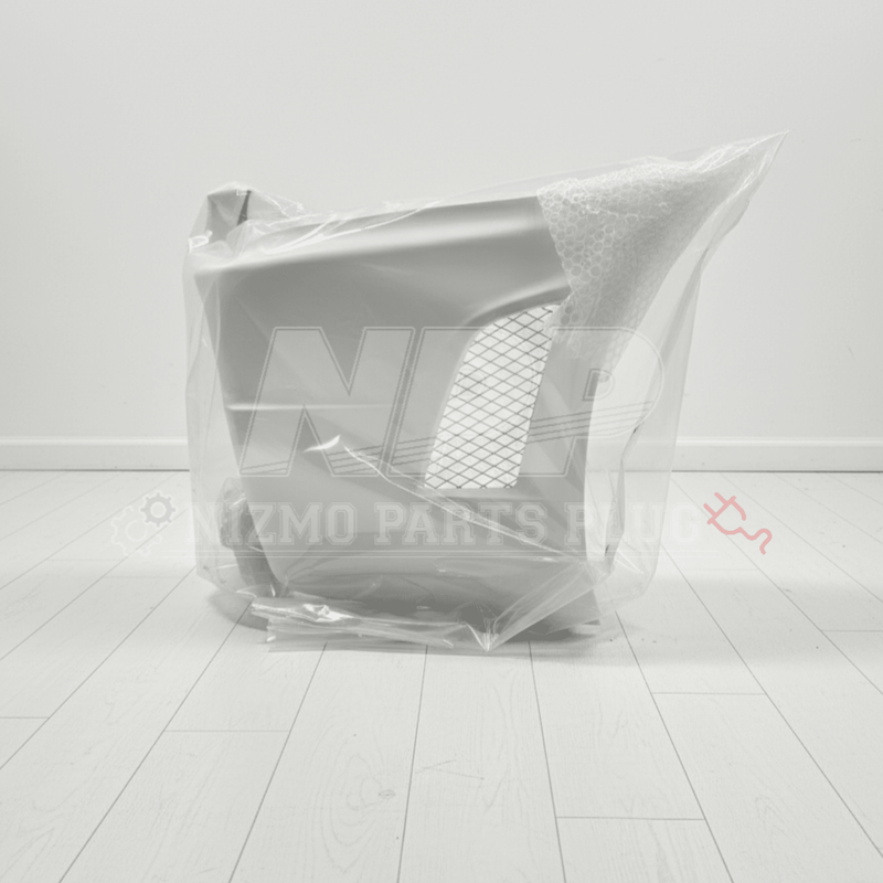 Load image into Gallery viewer, New white Nissan R34 GTR Nismo Z-Tune front bumper in protective plastic packaging.