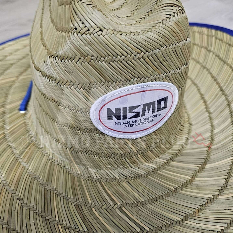 Load image into Gallery viewer, Vintage Nismo straw sun hat featuring the classic oval logo patch with blue trim.