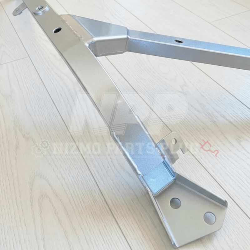 Load image into Gallery viewer, Silver Nismo front floor reinforcement bar for BNR34 GTR. New condition, V-shaped steel assembly.