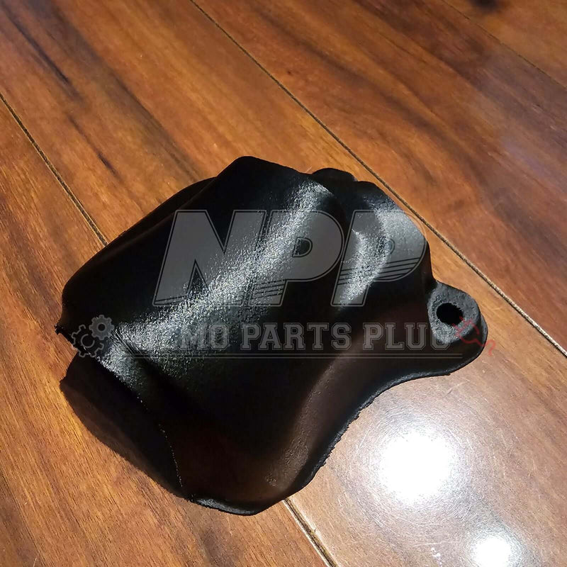 Load image into Gallery viewer, New matte black reproduction wiper motor cover for Nissan R32 Skyline, positioned on a wooden surface.