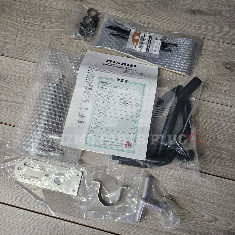 Load image into Gallery viewer, Nismo oil separator kit for Nissan Skyline GT-R R33/R34 RB26DETT. Includes hoses, metal brackets, and manual in bag.