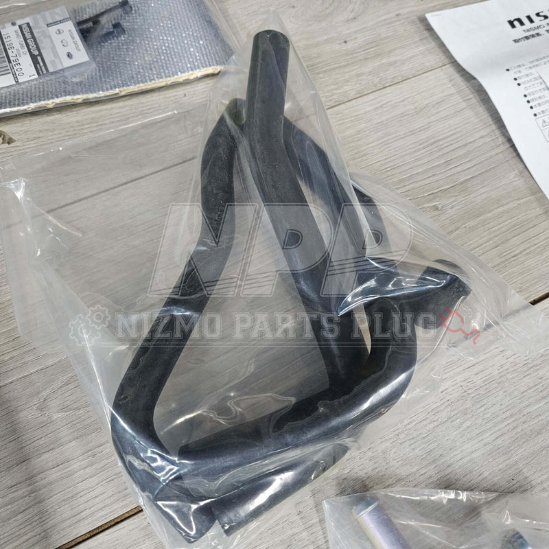 Load image into Gallery viewer, New Nismo black rubber oil separator hose for Nissan Skyline GT-R R33 and R34 RB26DETT, sealed in original packaging.