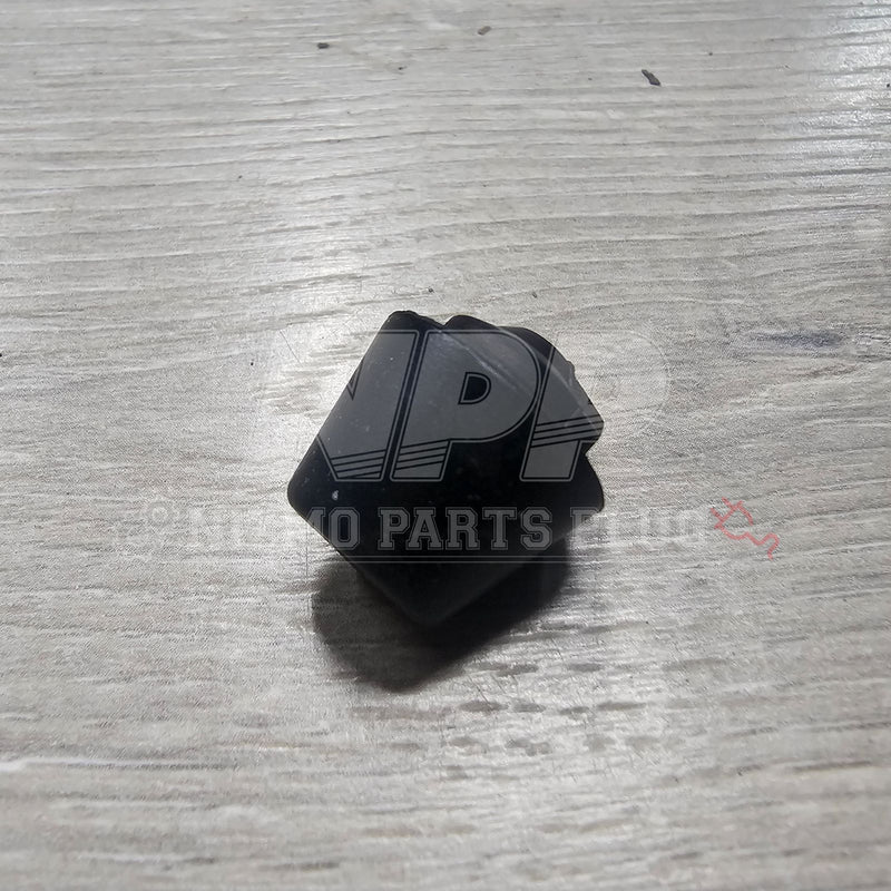 Load image into Gallery viewer, Black rubber door bumper stopper for Nissan R32 Skyline, shown on a wooden surface.