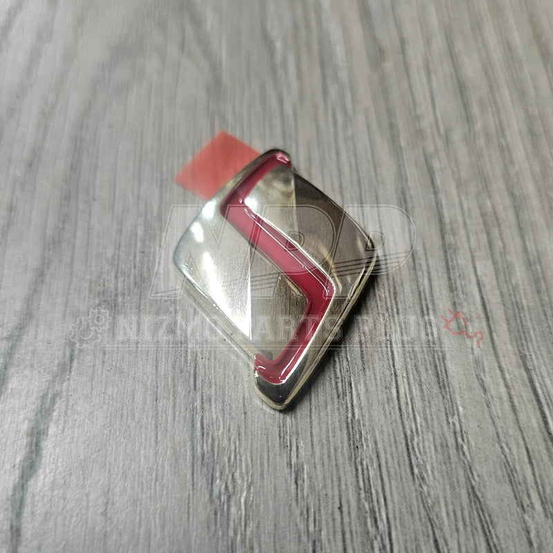 Load image into Gallery viewer, Nissan R32 Skyline Hood S Emblem - NizmoPartsPlug