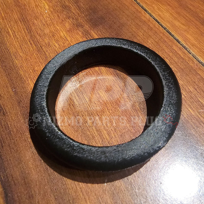 Load image into Gallery viewer, Black textured Mīrai Mamōru ignition ring cover for Nissan R34 Skyline, shown on a wooden surface.