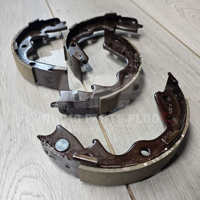 Load image into Gallery viewer, Nissan Pitwork R32/33/34 Skyline GTR Rear Brake Shoe Set - NizmoPartsPlug