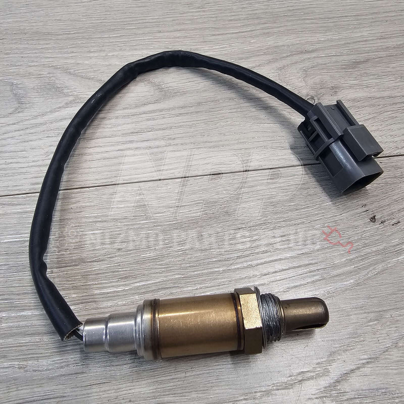 Load image into Gallery viewer, New front O2 oxygen sensor for Nissan R33/R34 Skyline GTR, featuring a metallic finish and grey electrical connector.