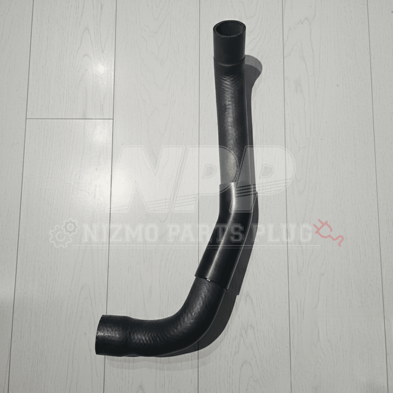 Load image into Gallery viewer, New black lower radiator coolant hose for Nissan R34 Skyline GTR on a white wooden background.