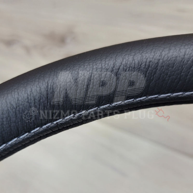 Load image into Gallery viewer, Nissan R34 Skyline GTR V-Spec Steering Wheel Assembly - NizmoPartsPlug