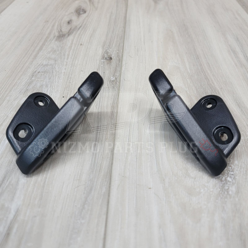 Load image into Gallery viewer, Nissan R34 Skyline Rear Upper Seatbelt Guide Set - NizmoPartsPlug
