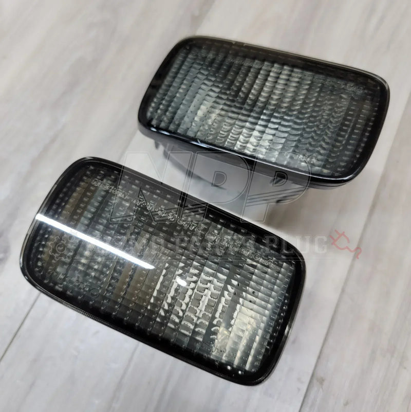 Load image into Gallery viewer, Nissan R34 Skyline GTT GTR Front Turn Signal Indicator Set (Smoked) - NizmoPartsPlug