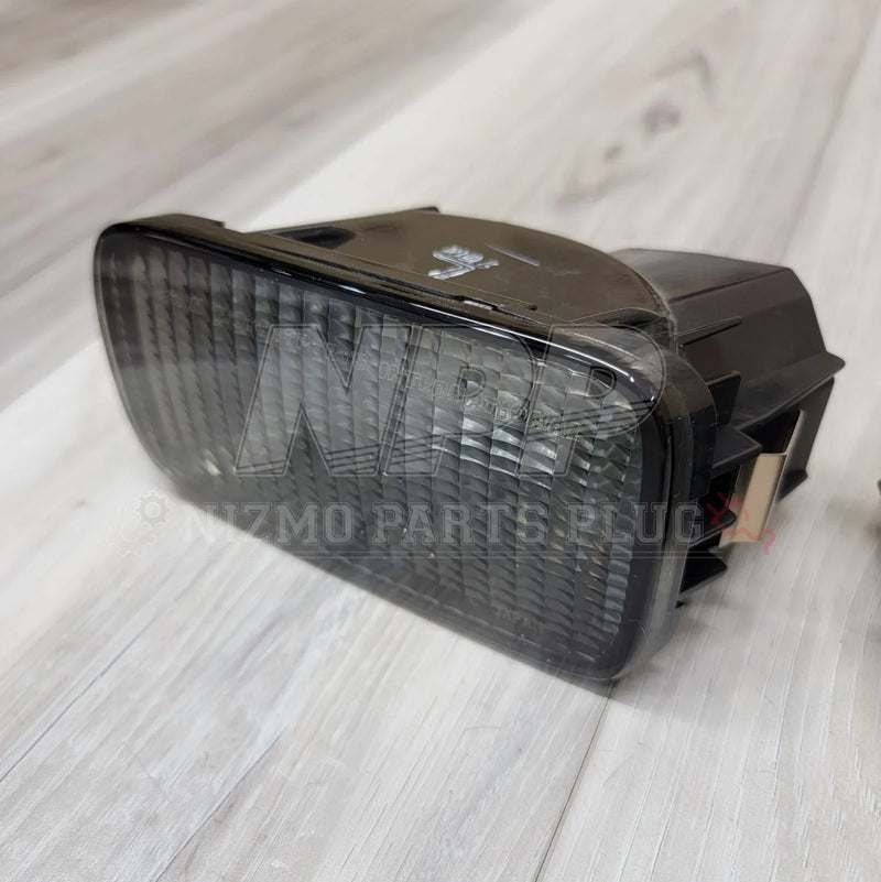 Load image into Gallery viewer, Nissan R34 Skyline GTT GTR Front Turn Signal Indicator Set (Smoked) - NizmoPartsPlug