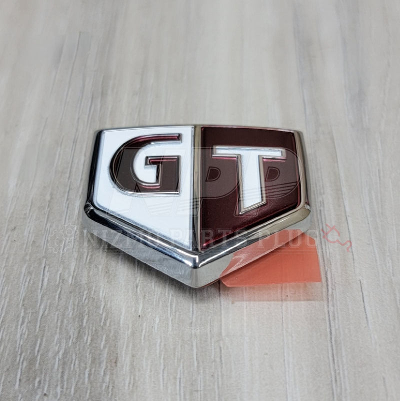 Load image into Gallery viewer, Nissan R34 Skyline GTT Fender Emblem (Red/White) - NizmoPartsPlug