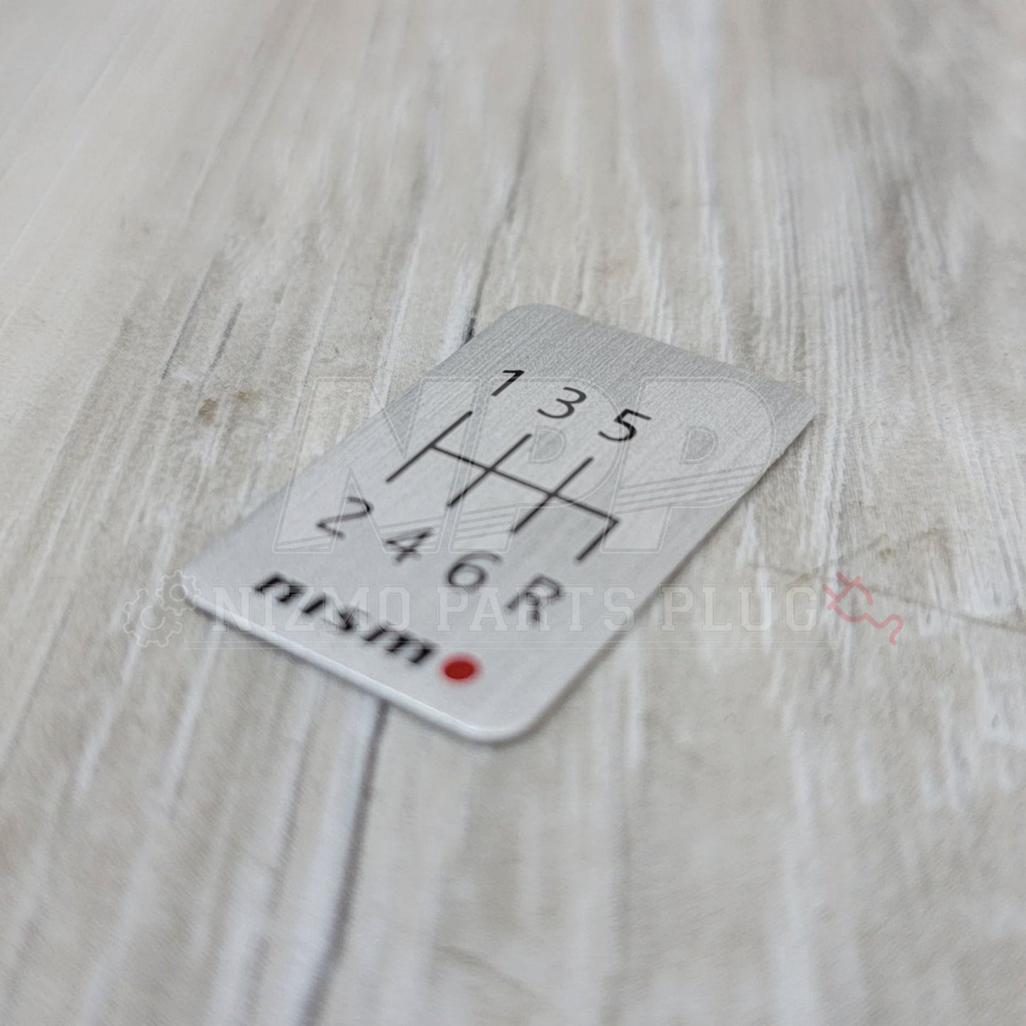 Nismo 6-Speed Manual Shift Pattern Brushed Emblem - NizmoPartsPlug