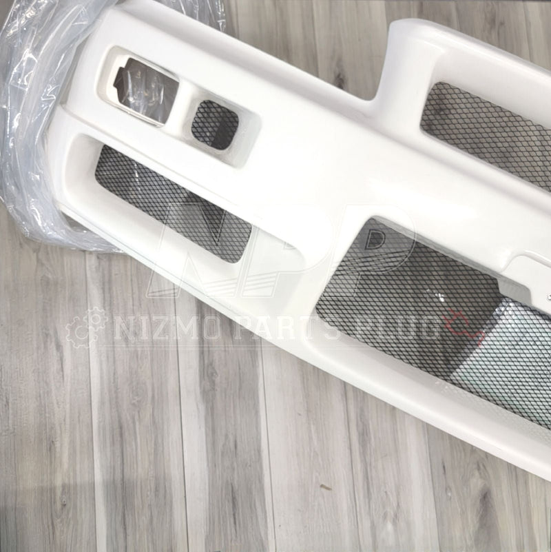 Load image into Gallery viewer, New white Nismo S-Tune front bumper for Nissan R34 Skyline GTR with black mesh inserts.