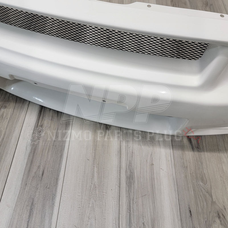 Load image into Gallery viewer, White Nissan R34 Skyline GTR Nismo S-Tune front bumper with black mesh grille.
