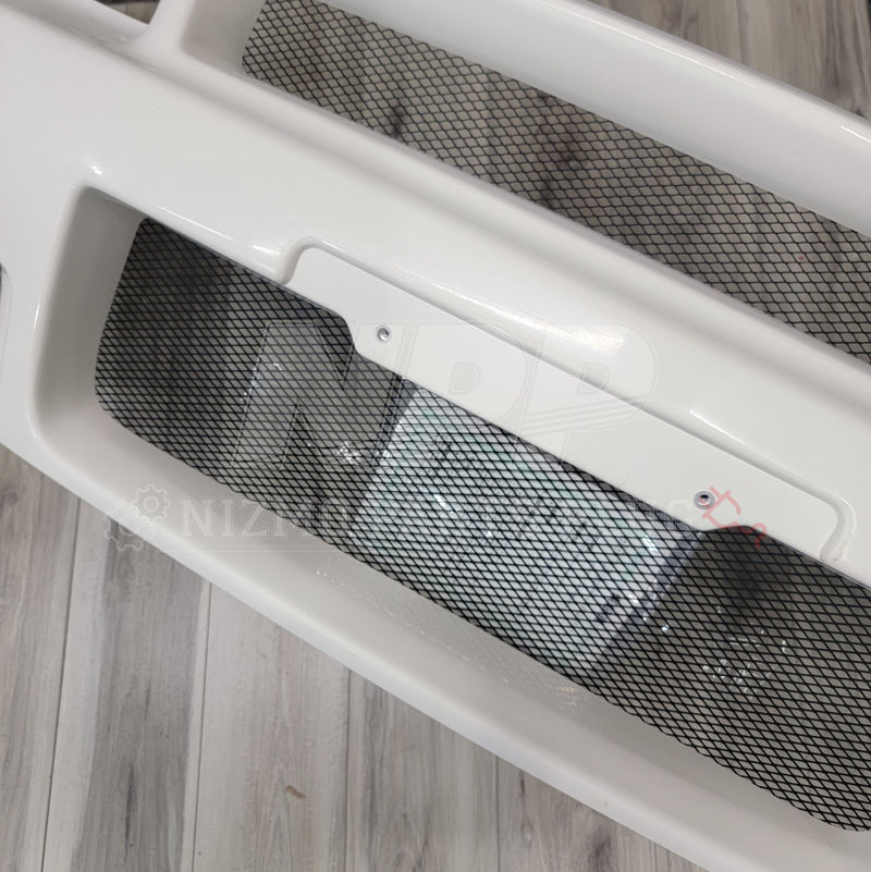 Load image into Gallery viewer, White Nissan R34 GTR Nismo S-Tune front bumper with black mesh grille.