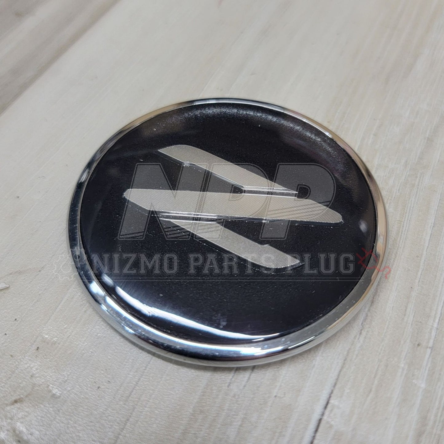 Nissan Z32 300ZX Black/Silver Front Emblem - NizmoPartsPlug