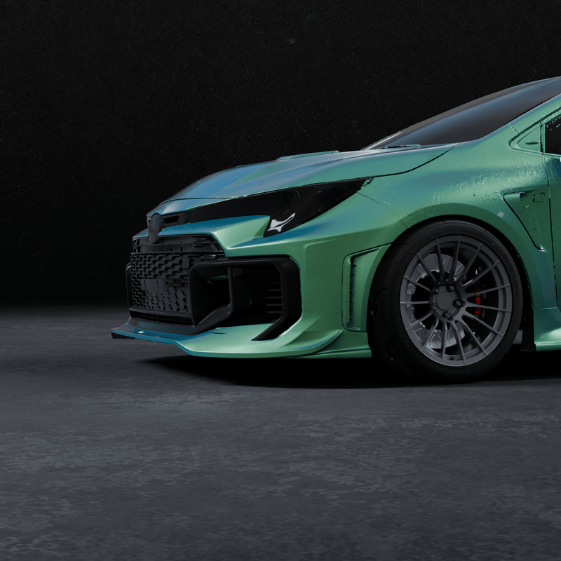 Load image into Gallery viewer, Black front lip on a metallic green Toyota GR Corolla (E210, 2025+ Kouki) against a dark background.