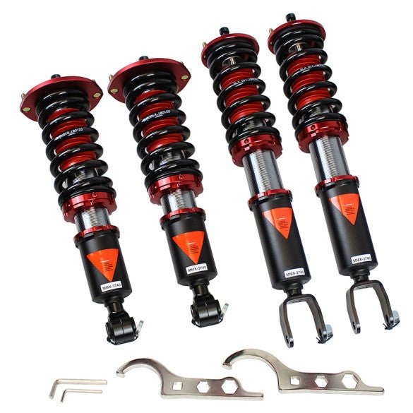 Load image into Gallery viewer, Godspeed coilovers for Nissan Skyline R32, featuring black and red springs, silver bodies, and adjustment wrenches.