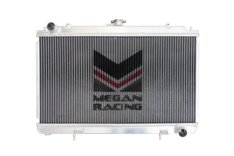 Load image into Gallery viewer, New 3-row aluminum Megan Racing radiator for Nissan 240SX S14, featuring silver finish and central brand logo.