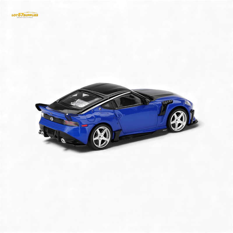 Load image into Gallery viewer, Mini GT 1:64 scale Nissan Z VeilSide FFZ400 in Seiran Blue with black roof and silver wheels.