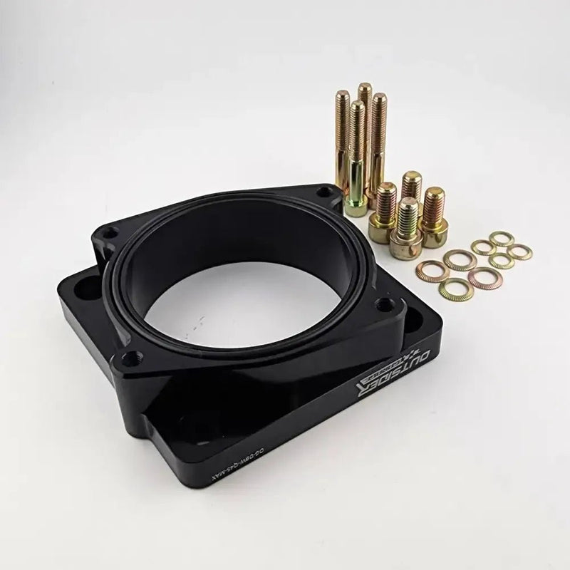 ギャラリービューアに画像をロードする, Black aluminum Q45 throttle body adapter for Nissan Maxima DBW, includes gold-toned mounting bolts and washers.